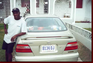The great deejay Trinity with his car